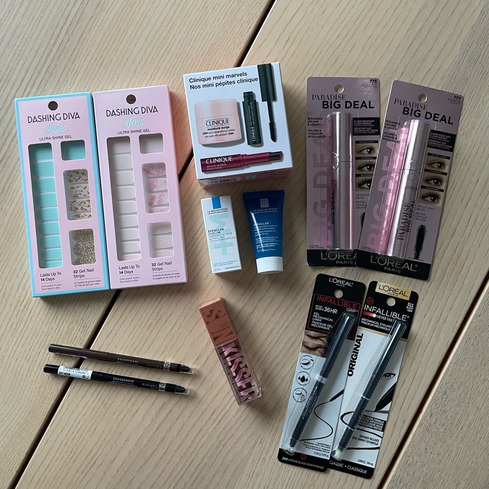 Large Unopened makeup lot - Clinique, eyeliners, blush, press on nails large lot